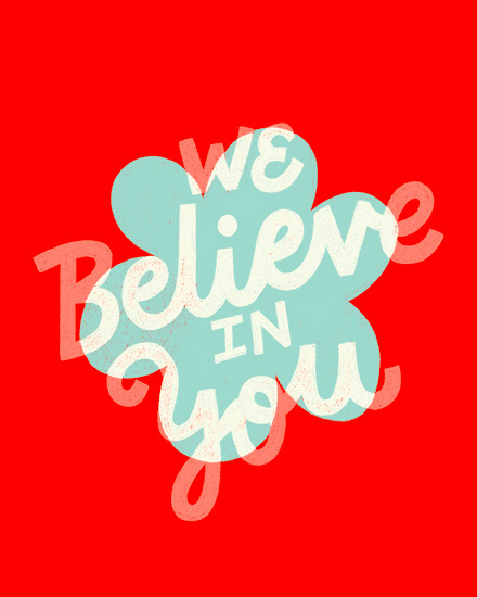 Red background with teal clover shape and white hand-lettered text, “We Believe In You.”