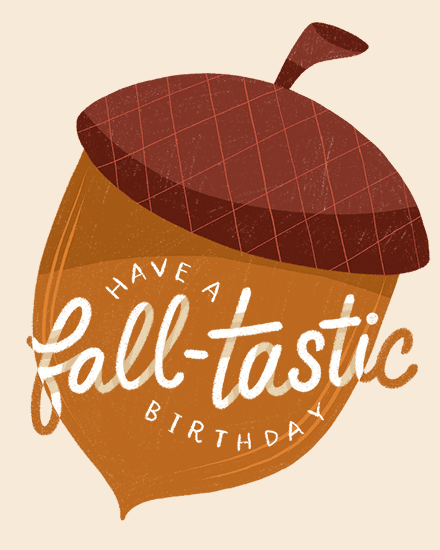 Large acorn illustration with patterned cap and text Have A Fall-tastic Birthday