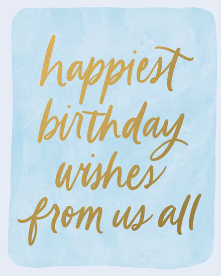 Gold hand-lettered message on light blue watercolor background reading “happiest birthday wishes from us all.”