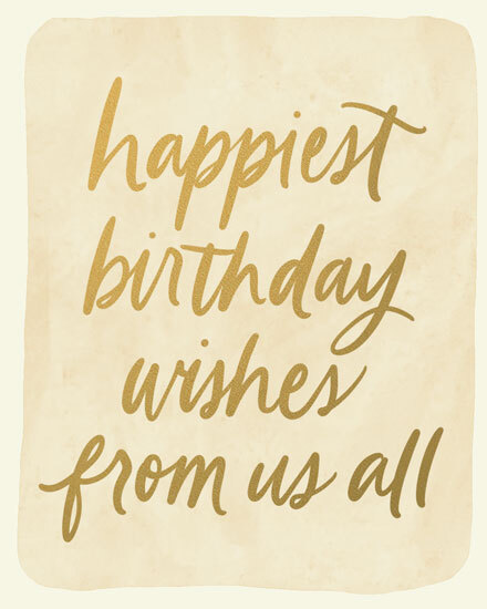 Gold handwritten script reading “happiest birthday wishes from us all” on cream background