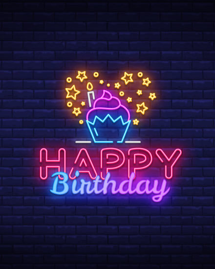 neon letters on wall birthday card cupcake candle star brick