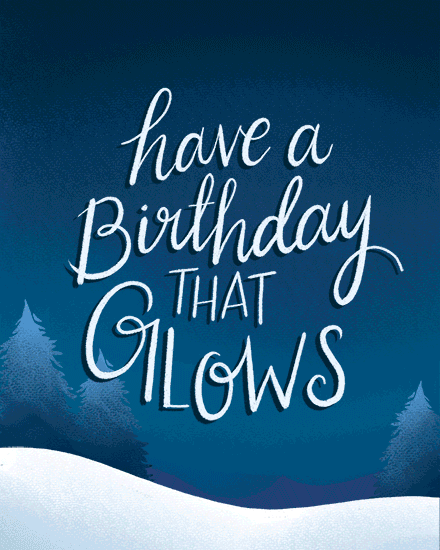 Blue winter scene with snowdrifts and trees, hand-lettered text: Have a Birthday That Glows