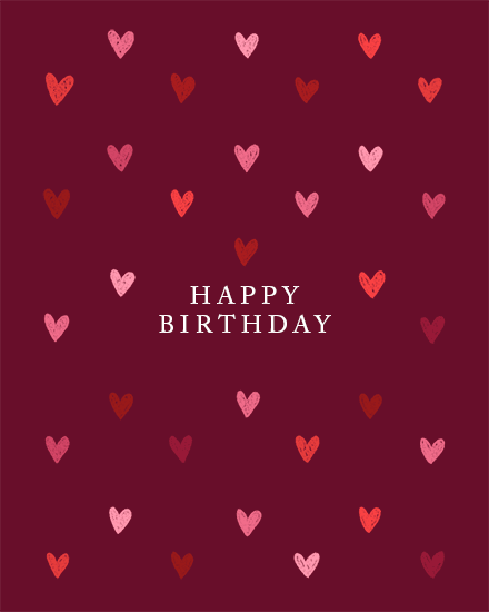 Burgundy background with scattered pink and red hearts and white Happy Birthday text