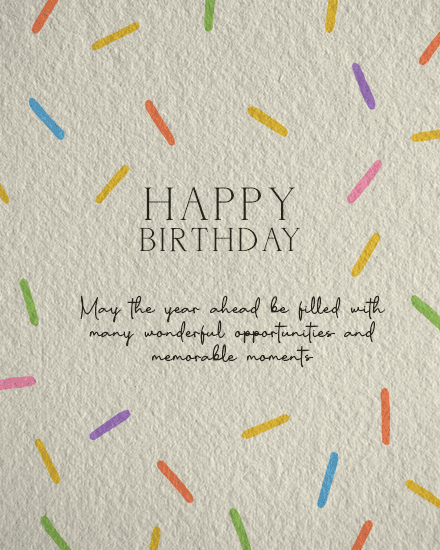 Happy Birthday text on textured paper with colorful confetti sprinkles and a heartfelt message
