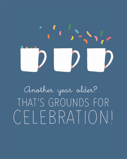 Three white coffee mugs with confetti on blue background, punny birthday message