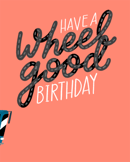 Coral birthday greeting with road-shaped lettering and small car illustration on left
