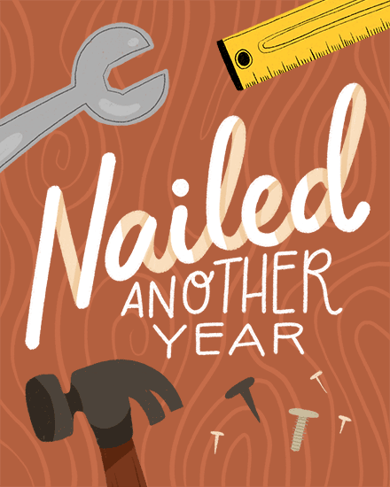 Woodgrain background with tools and “Nailed Another Year” hand-lettered birthday message