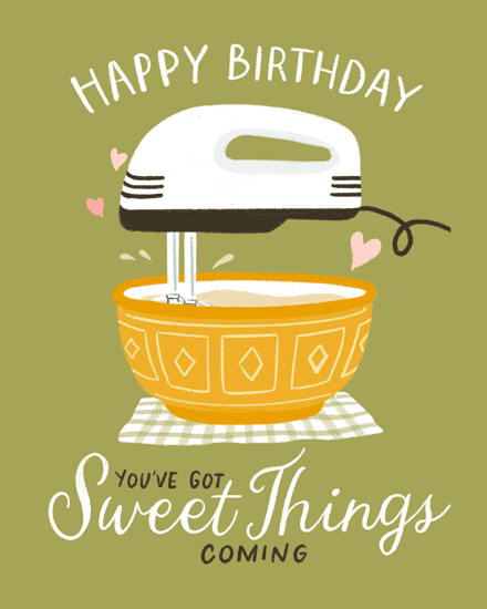 Hand mixer in orange bowl with hearts on olive background, sweet birthday message