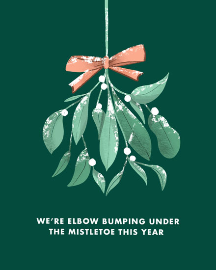 holiday season holiday card elbow bumping under the mistletoe