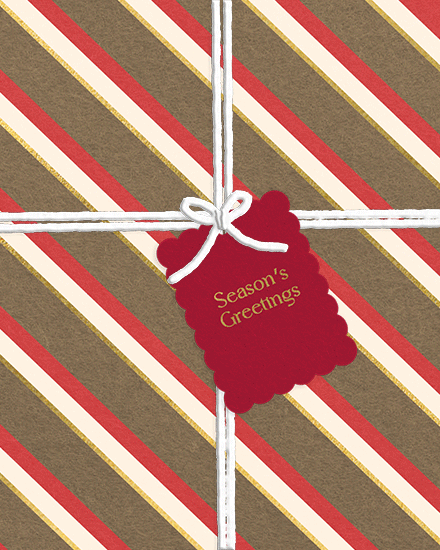 Card with diagonal red and gold stripes, white ribbon, and red Season's Greetings tag.
