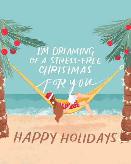 Woman in hammock on beach between decorated palm trees with holiday text.