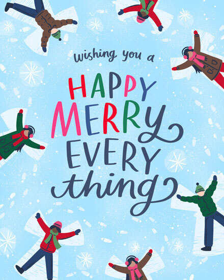 Children making snow angels with 'Happy Merry Everything' text on a blue background.