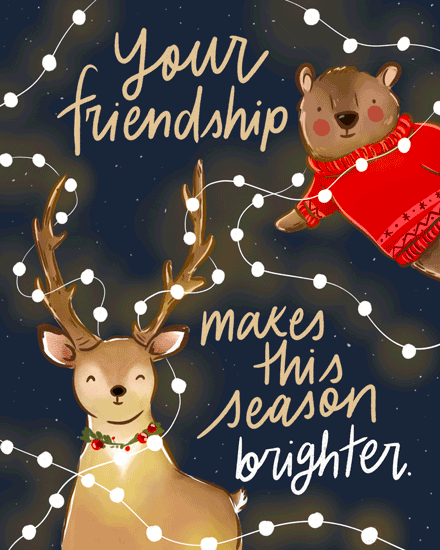 A bear in a red sweater and a reindeer with lights on a festive card.