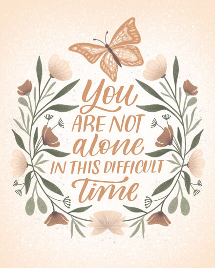 Watercolor floral wreath with butterfly and “You are not alone” message in warm tones